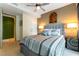 Comfortable bedroom with a stylish bed, ceiling fan, and views to an adjacent room at 3722 Las Vegas Blvd # 1908, Las Vegas, NV 89158