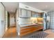 Modern kitchen with stainless steel appliances, sleek cabinetry, and tile flooring at 3722 Las Vegas Blvd # 1908, Las Vegas, NV 89158