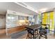 Modern kitchen with wood cabinets, stainless steel appliances, and spacious countertops with breakfast bar at 3722 Las Vegas Blvd # 1908, Las Vegas, NV 89158