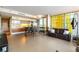 Open-concept layout featuring the living room, kitchen, and breakfast bar with access to city views at 3722 Las Vegas Blvd # 1908, Las Vegas, NV 89158