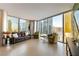 Modern living room featuring floor-to-ceiling windows with city views, tile floors, and a comfortable seating area at 3722 Las Vegas Blvd # 1908, Las Vegas, NV 89158