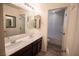 Bathroom with dual vanity, large mirror, and shower with tub at 386 Espressivo St, Henderson, NV 89011