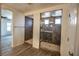 Stylish bathroom featuring a walk-in shower with tile surround at 386 Espressivo St, Henderson, NV 89011