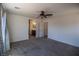Spacious bedroom featuring neutral carpet and an ensuite bathroom at 386 Espressivo St, Henderson, NV 89011