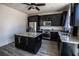 Modern kitchen features granite countertops, dark cabinets and stainless-steel appliances at 386 Espressivo St, Henderson, NV 89011