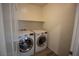 Laundry room featuring a side-by-side washer and dryer at 386 Espressivo St, Henderson, NV 89011