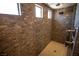 Modern shower with tiled walls and rainfall shower head at 386 Espressivo St, Henderson, NV 89011