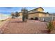 Backyard view with hardscape and desert landscaping at 3938 E Chaffe Ave, Pahrump, NV 89061