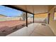 View of the covered patio and hardscaped backyard at 3938 E Chaffe Ave, Pahrump, NV 89061