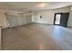 Spacious two-car garage with epoxy flooring and convenient access door at 3938 E Chaffe Ave, Pahrump, NV 89061