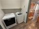 Laundry room with appliances and shelving at 3938 E Chaffe Ave, Pahrump, NV 89061