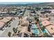 Overhead view showing the neighborhood with pools, solar panels, and well-maintained landscaping at 3961 Equinox Ct, Las Vegas, NV 89147