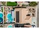 Detailed overhead view of a backyard featuring a pool, spa, and modern outdoor seating area at 3961 Equinox Ct, Las Vegas, NV 89147
