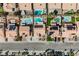 Detailed overhead view of multiple backyards each featuring a pool and desert landscaping at 3961 Equinox Ct, Las Vegas, NV 89147