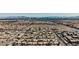 Scenic aerial shot of a residential area with the city skyline in the distance at 3961 Equinox Ct, Las Vegas, NV 89147