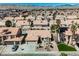 Aerial view of a residential area showcasing the home's surroundings with desert landscaping at 3961 Equinox Ct, Las Vegas, NV 89147