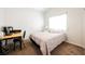 Bedroom with neutral carpet, work desk, and bright window at 3961 Equinox Ct, Las Vegas, NV 89147