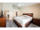 Comfortable bedroom with ensuite, walk-in closet, and ceiling fan at 3961 Equinox Ct, Las Vegas, NV 89147