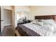 Bedroom with sliding mirror closet doors with direct access to the bathroom at 3961 Equinox Ct, Las Vegas, NV 89147