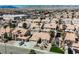 Beautiful suburban homes featuring desert landscaping, tile roofs, and attached garages at 3961 Equinox Ct, Las Vegas, NV 89147