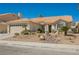 Inviting single-story home boasting a well-kept front yard with mature landscaping and tiled roof at 3961 Equinox Ct, Las Vegas, NV 89147