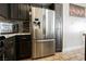 Kitchen area showcasing a stainless steel refrigerator with water and ice dispenser at 3961 Equinox Ct, Las Vegas, NV 89147