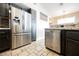 This modern kitchen features stainless steel appliances with granite countertops at 3961 Equinox Ct, Las Vegas, NV 89147