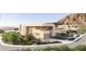 Exterior view of a multi-story house with a desert landscape at 4 Kaya Canyon Way # 15, Henderson, NV 89012