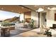 An open-concept space featuring a firepit, dining area, and mountain views at 4 Kaya Canyon Way # 15, Henderson, NV 89012