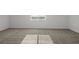 Bright, carpeted room with a window offering natural light at 4216 Golden Sol St, North Las Vegas, NV 89032