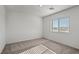 Carpeted bedroom featuring neutral paint, base molding, recessed lighting, and a large window at 4253 Gold Desert St, North Las Vegas, NV 89032