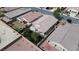 An aerial view of a single-Gathering home featuring a landscaped backyard and a covered patio at 4429 S Glory Vine Ln, Pahrump, NV 89061
