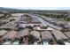 A view from above showcases a residential neighborhood with well-maintained lawns and desert landscapes at 4429 S Glory Vine Ln, Pahrump, NV 89061