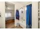 Bright bathroom showcases a shower-tub combo with a stylish curtain at 4429 S Glory Vine Ln, Pahrump, NV 89061