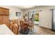 Bright dining area with sliding glass doors to outdoor space at 4429 S Glory Vine Ln, Pahrump, NV 89061