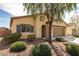 Charming single-story home with a low maintenance front yard and attached garage at 4429 S Glory Vine Ln, Pahrump, NV 89061