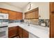Updated kitchen with quartz countertops, stainless steel appliances, and wood cabinets at 4429 S Glory Vine Ln, Pahrump, NV 89061