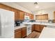 Well-lit kitchen boasts updated appliances, bright countertops, and ample cabinet space at 4429 S Glory Vine Ln, Pahrump, NV 89061