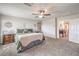 Tranquil main bedroom with carpet floors and soft natural light offers a calming retreat at 4442 Solitude Falls Ave, North Las Vegas, NV 89084