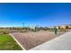 A community playground with a volleyball pit allows for multiple outdoor activites with Gathering and friends at 4442 Solitude Falls Ave, North Las Vegas, NV 89084