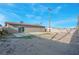 Spacious backyard, partially hardscaped with block wall fencing, ready for customization at 4629 Alta Dr, Las Vegas, NV 89107