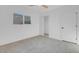 Bedroom with neutral carpet, closet, ceiling fan and a window with a view at 4629 Alta Dr, Las Vegas, NV 89107