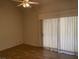 Bedroom with natural light, neutral colors, and wood flooring, offering a comfortable atmosphere at 5041 Mount Pleasant Ln, Las Vegas, NV 89113