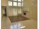 Spacious living room featuring a fireplace, large windows, and neutral colors, perfect for relaxing at 5041 Mount Pleasant Ln, Las Vegas, NV 89113