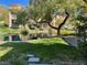 Scenic waterfront home with lush trees lining the water and gorgeous backyard views at 5041 Mount Pleasant Ln, Las Vegas, NV 89113