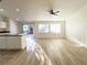 Inviting living room featuring an island and sliding glass doors that let in ample natural light at 5829 Aqua Verde St, North Las Vegas, NV 89031