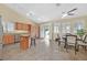 Bright dining area featuring tile flooring and sliding glass doors to backyard at 5835 Farmhouse Ct, Las Vegas, NV 89141