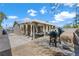 View of backyard featuring covered patio, barbecue grill and minimal landscaping at 6121 Dayton Cir, Las Vegas, NV 89107