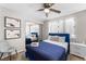 Bedroom featuring a mirrored closet, ceiling fan, and modern decor at 6121 Dayton Cir, Las Vegas, NV 89107