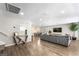 Open-concept living room with wood floors, recessed lighting, and a contemporary design at 6121 Dayton Cir, Las Vegas, NV 89107
